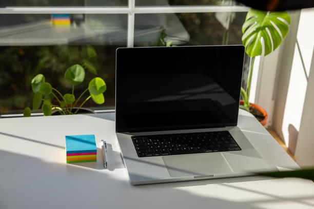 istock Laptop and adhesive notes on the desk 1433904290