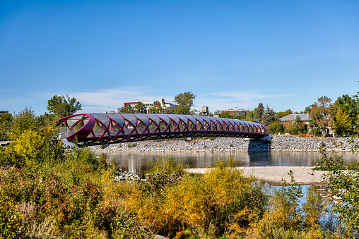 Calgary, Alberta - September 25, 2022: The pedestrian Peace Bridge over the Bow River designed by Santiago Calatrava