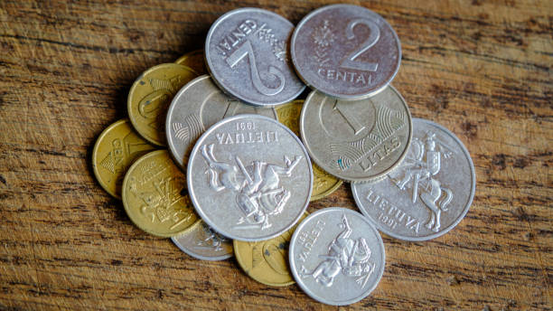 istock Various old Lithuanian coins isolated on wooden background. 1433908051