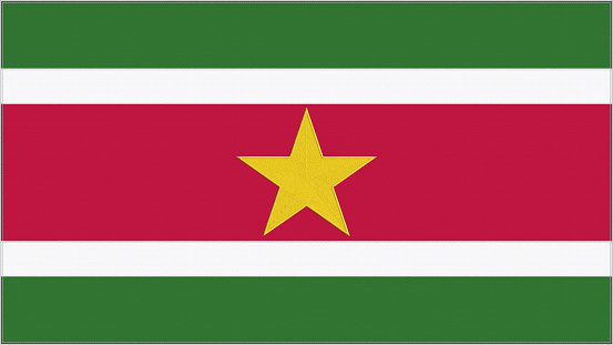 Suriname embroidery flag. Surinamese emblem stitched fabric. Embroidered coat of arms. Country symbol textile background.