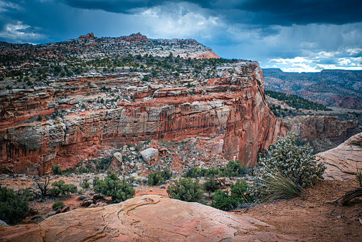 Mountain and storm clouds in the distance at Capitol Reef National Park