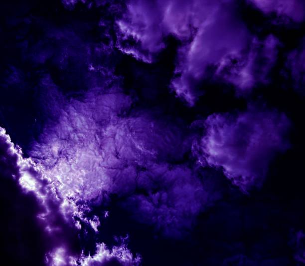 istock Surreal purple clouds in magical sky. 1433909810