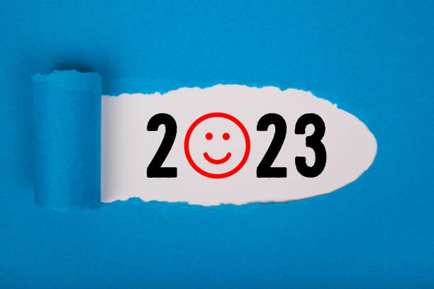 istock Torn Paper With Happy New Year 2023 On White Background 1433909984