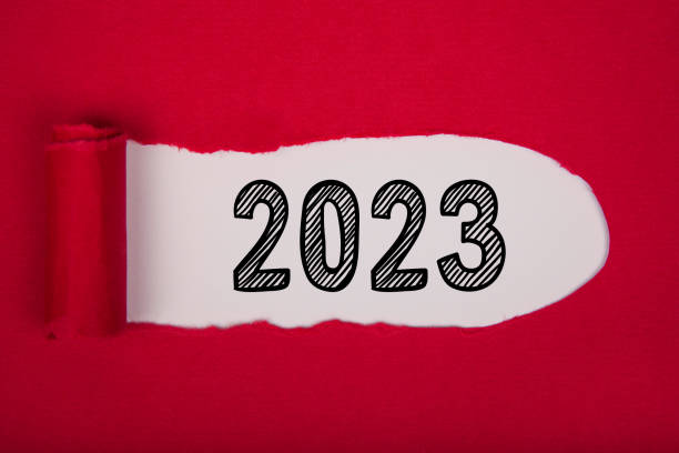 istock Torn Paper With Happy New Year 2023 On White Background 1433910123