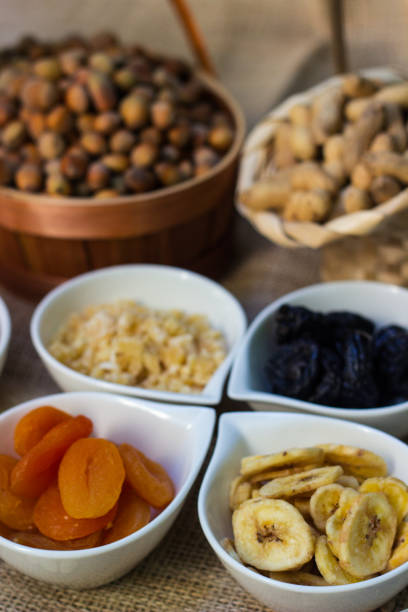 top view of assorted turkish dried fruits and nuts isolated on white
