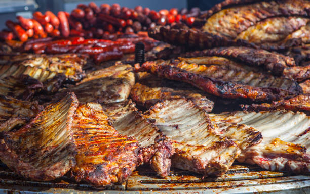 istock Circular grill loaded full of pork ribs 1433911989