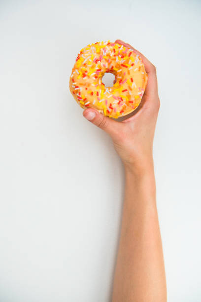 istock Tasty orange donut 1433916791