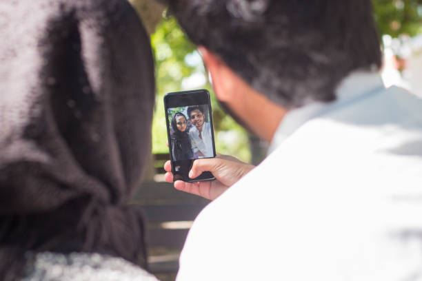 istock Back view of young Muslim couple 1433923484