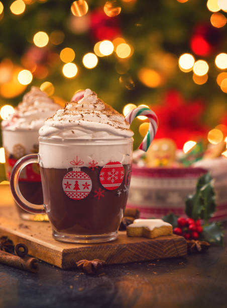 Hot Chocolate for The Christmas Two cups of hot chocolate with whipped cream and candy cane for the Christmas Christmas Tree Cookie stock pictures, royalty-free photos & images