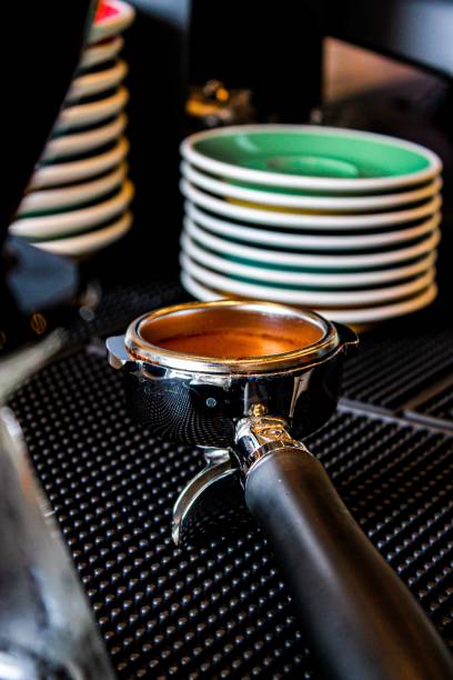 istock Vertical shot of a coffee machine portafilter with ground coffee inside 1433933893