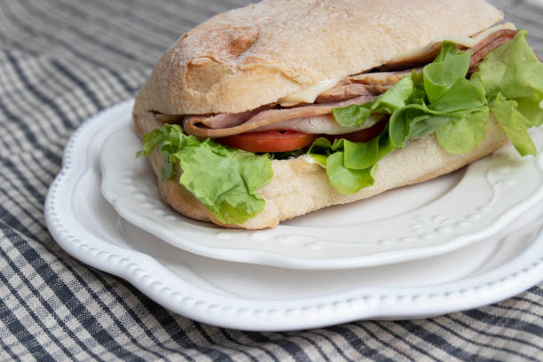 istock Ham and Cheese Sandwich on white background 1433945073
