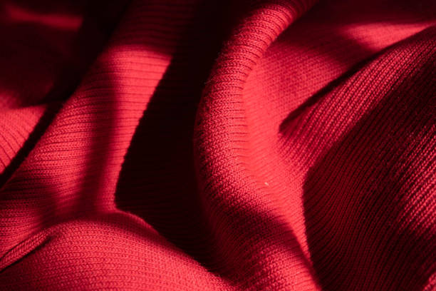 istock Gentle Light on Red Knit Fabric 1433945210