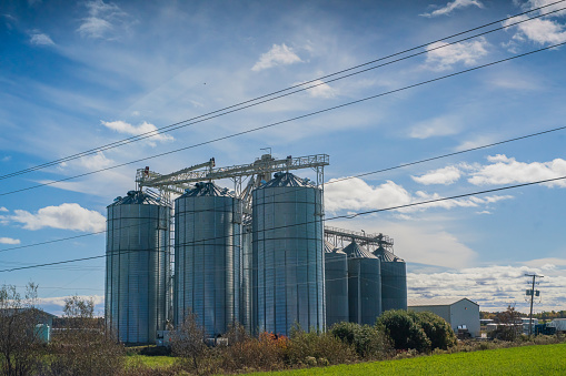 Large Grain Silos with a Blue Sky in the background