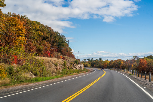 Autumn Landscape - Car Travelling through the Canadian Shield