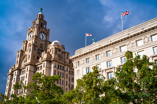 Liverpool Pier head featuring Royal Liver building and Cunard building in England UK United Kingdom