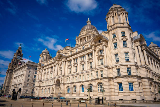 Liverpool Pier Head with buildigs as Royal Liver, Port of Liverpool and Cunard buildings in England UK United Kingdom
