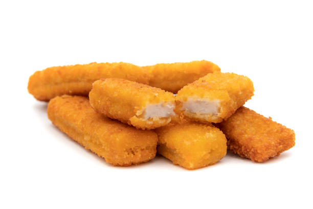 Tasty crispy fried fish sticks (fish fingers) on white background. Tasty crispy fried fish sticks (fish fingers) on white background. Fast food concept. fish stick stock pictures, royalty-free photos & images