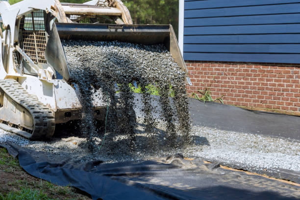 istock In preparing the platform for installing the storage shed near your home, a tractor uploaded gravel preparations for the platform 1433960837