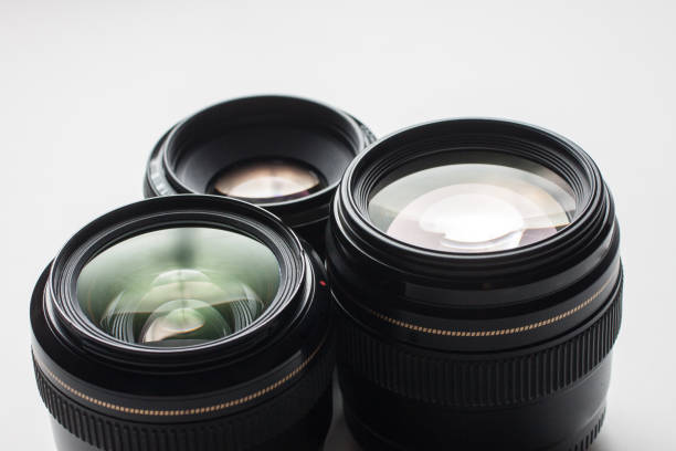 istock close-up view of a group of camera lenses on a white surface 1433972059