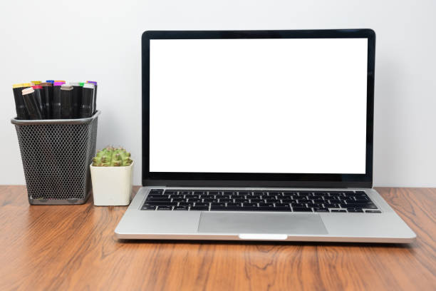 istock Workspace desk and laptop. copy space and blank screen. Business image, Blank screen laptop and supplies. 1433975708
