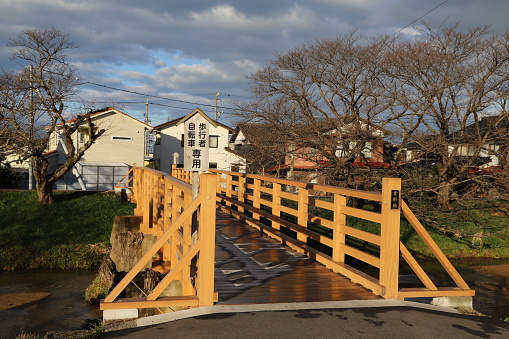 Wooden bridge across the canal in Tamatsukuri-Onsen, Shimane Prefecture.