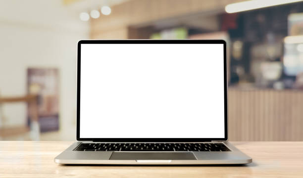 Laptop blank screen on wood table with coffee cafe background, mockup, template for your text, Clipping paths included for background and device screen