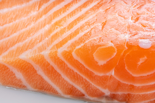 Close up view fresh Salmon fish fillet, Natural Atlantic Norwegian Salmon Fillet Texture.