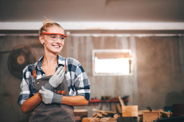 Carpenter woman standing smile.