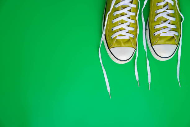 Green sneakers on a white background