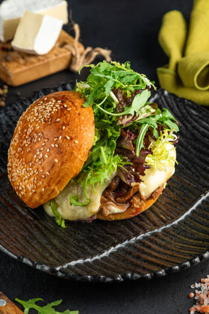 istock Vegetarian lentil burger and Close-up home made beef burger and curry sauce. Light background, 1434022150