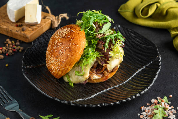 istock Vegetarian lentil burger and Close-up home made beef burger and curry sauce. Light background, 1434022462