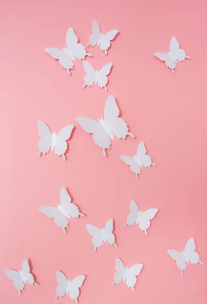 istock Design for wall, white butterflies on pink background, abstract, creative 1434023393
