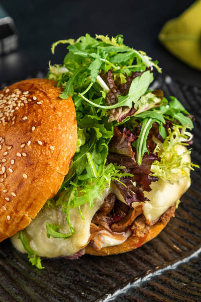 istock Vegetarian lentil burger and Close-up home made beef burger and curry sauce. Light background, 1434023406