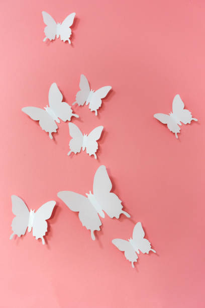 istock Design for wall, white butterflies on pink background, abstract, creative 1434024353