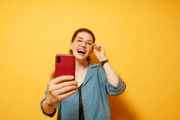 istock woman with smartphone 1434038815
