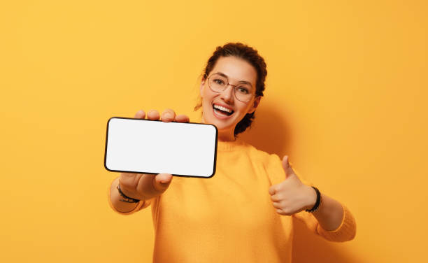 istock woman with smartphone 1434038837