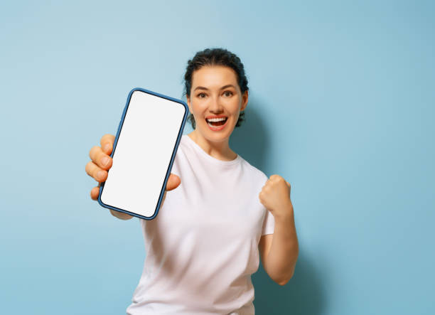 woman with smartphone stock photo