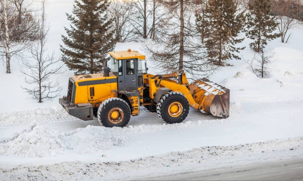 istock Snow clearing. Tractor clears the way after heavy snowfall. 1434042937