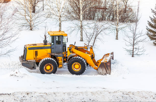 istock Snow clearing. Tractor clears the way after heavy snowfall. 1434043152