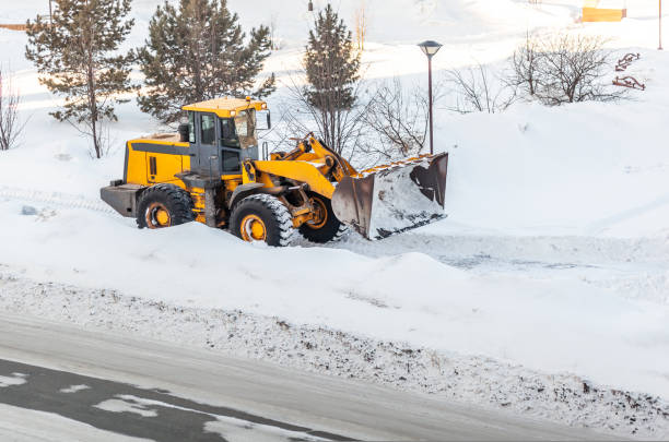 istock Snow clearing. Tractor clears the way after heavy snowfall. 1434043193