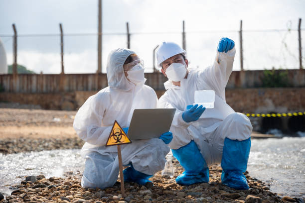istock Ecologist sampling taken dead fish to inspaction and save data to laptop computer 1434044698