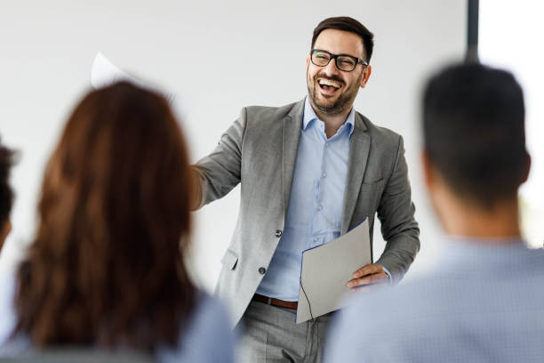 istock Happy businessman having an engaging presentation in the office. 1434044962