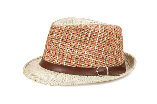 Hat on a white background. Light hat with brown leather strap.
