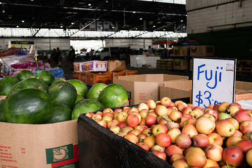 Fuji apples and watermelons for sale at Paddy’s Fresh Food Market in Flemington, Sydney — New South Wales, Australia
