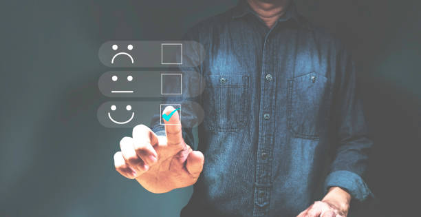 istock Customer service and Satisfaction concept, Business people touching the virtual screen on the happy Smile face icon to give satisfaction in service. rating very impressed 1434048740
