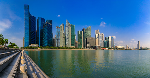 Panorama with downtown skyscrapers of the city business district skyline at Marina Bay in Singapore