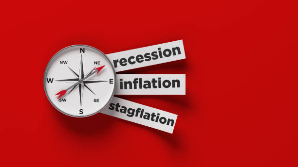 Compass recession inflation and stagflation text on red color background stock photo