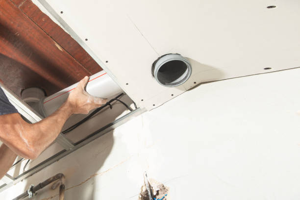 istock Worker repairing plastic chimney pipe at home. 1434055317