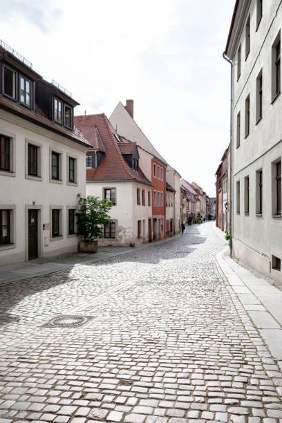 istock cobbled street in old town 1434057582
