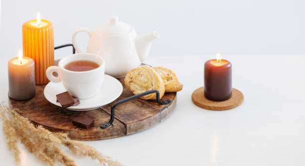 istock still life with burning candles in white modern interior 1434057788